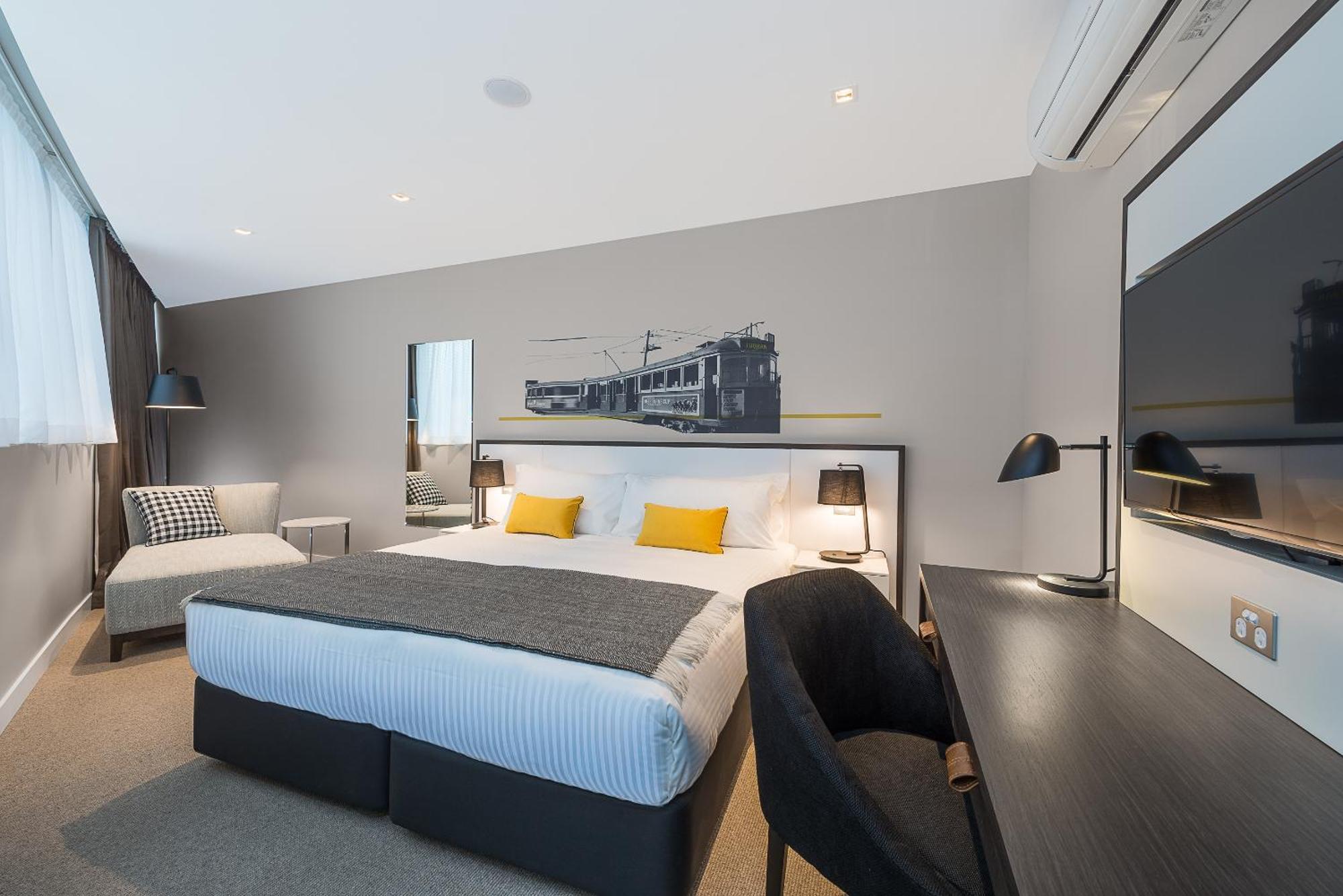 Hotel Peppers Docklands à Ville de Ville de Melbourne Extérieur photo A bedroom at the hotel